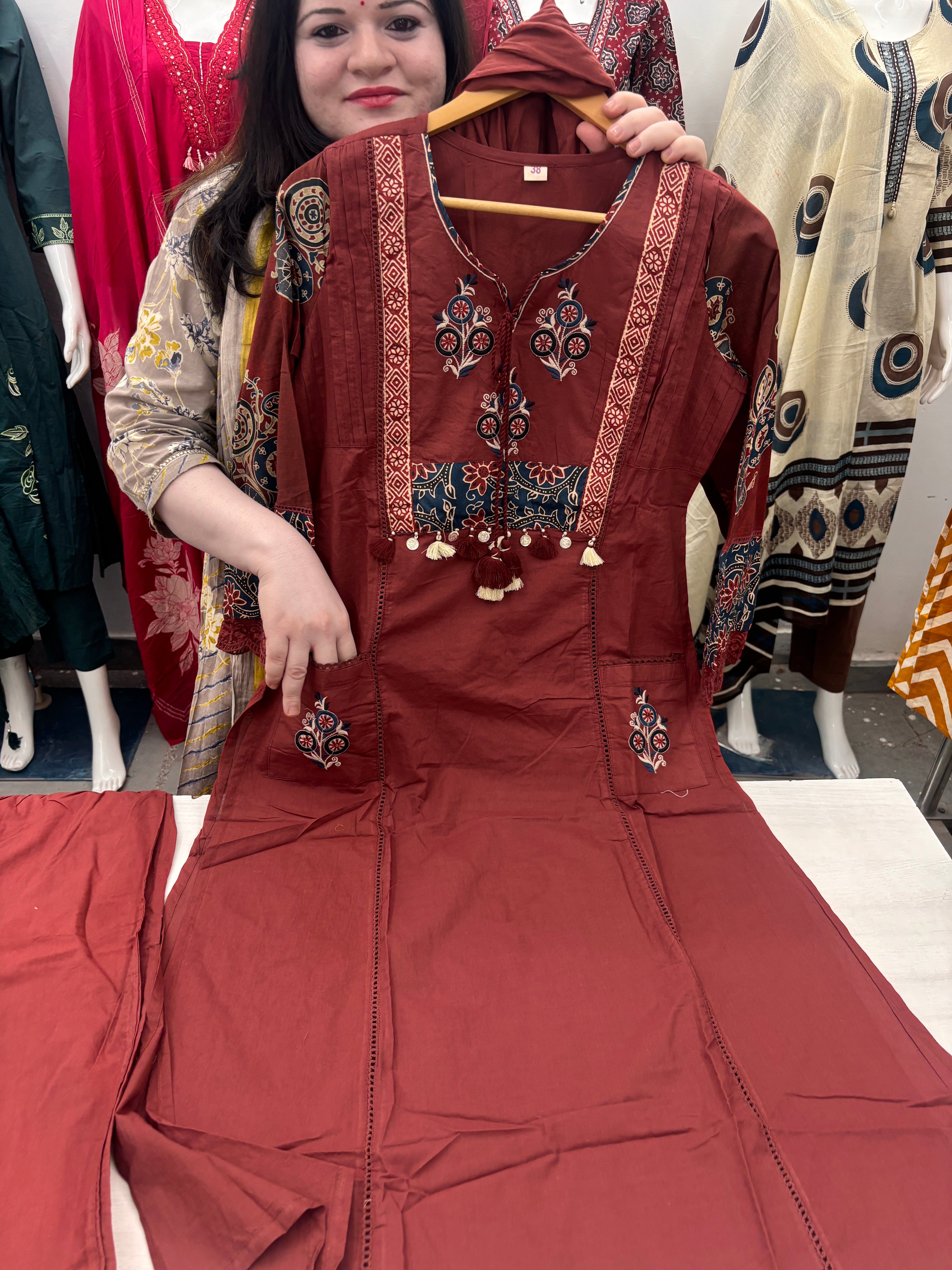 A line plazzo dupatta suit set with front pocket and embroidery detailing on neck