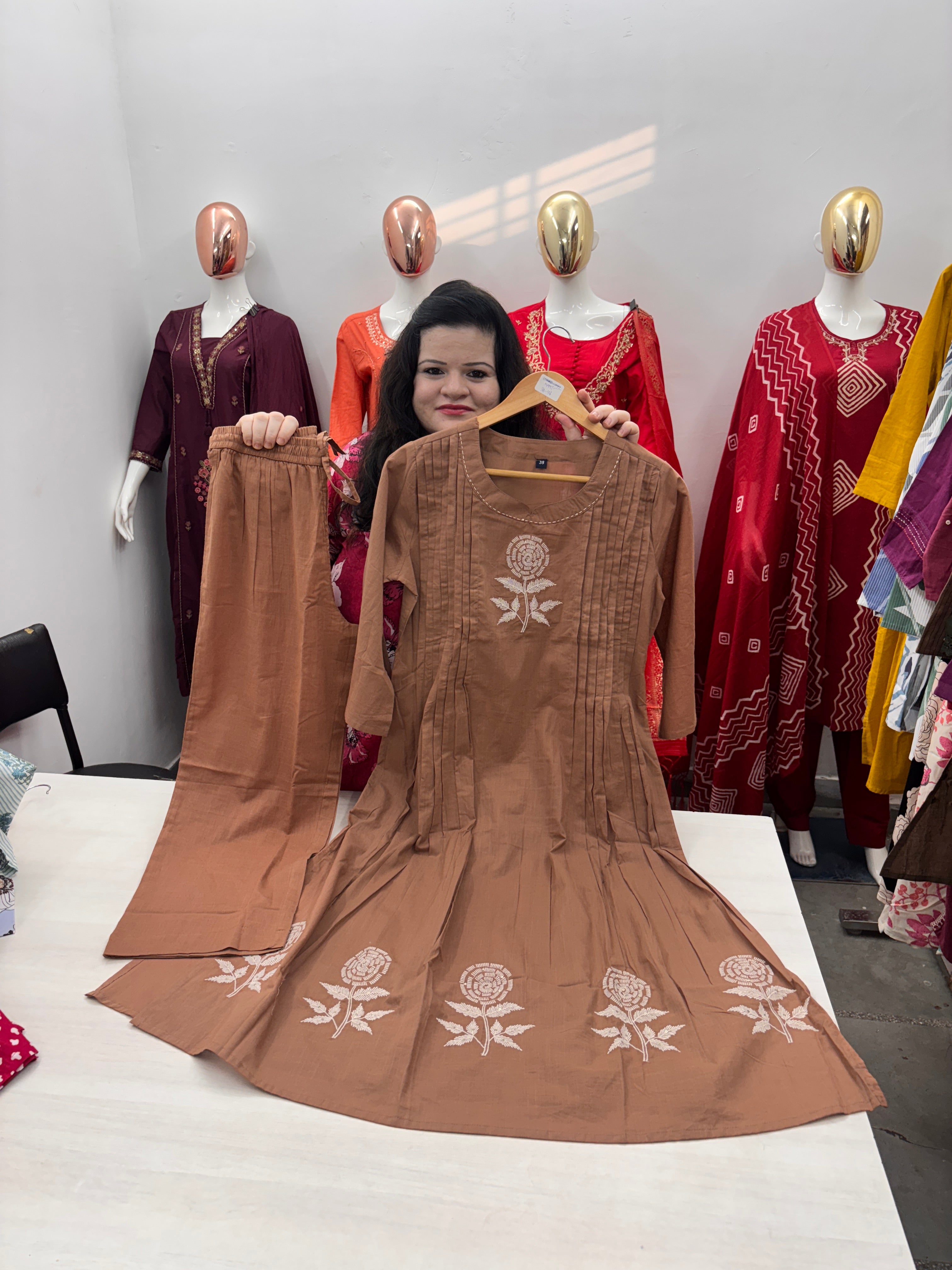 Round neck coord set with hand work and pintex style