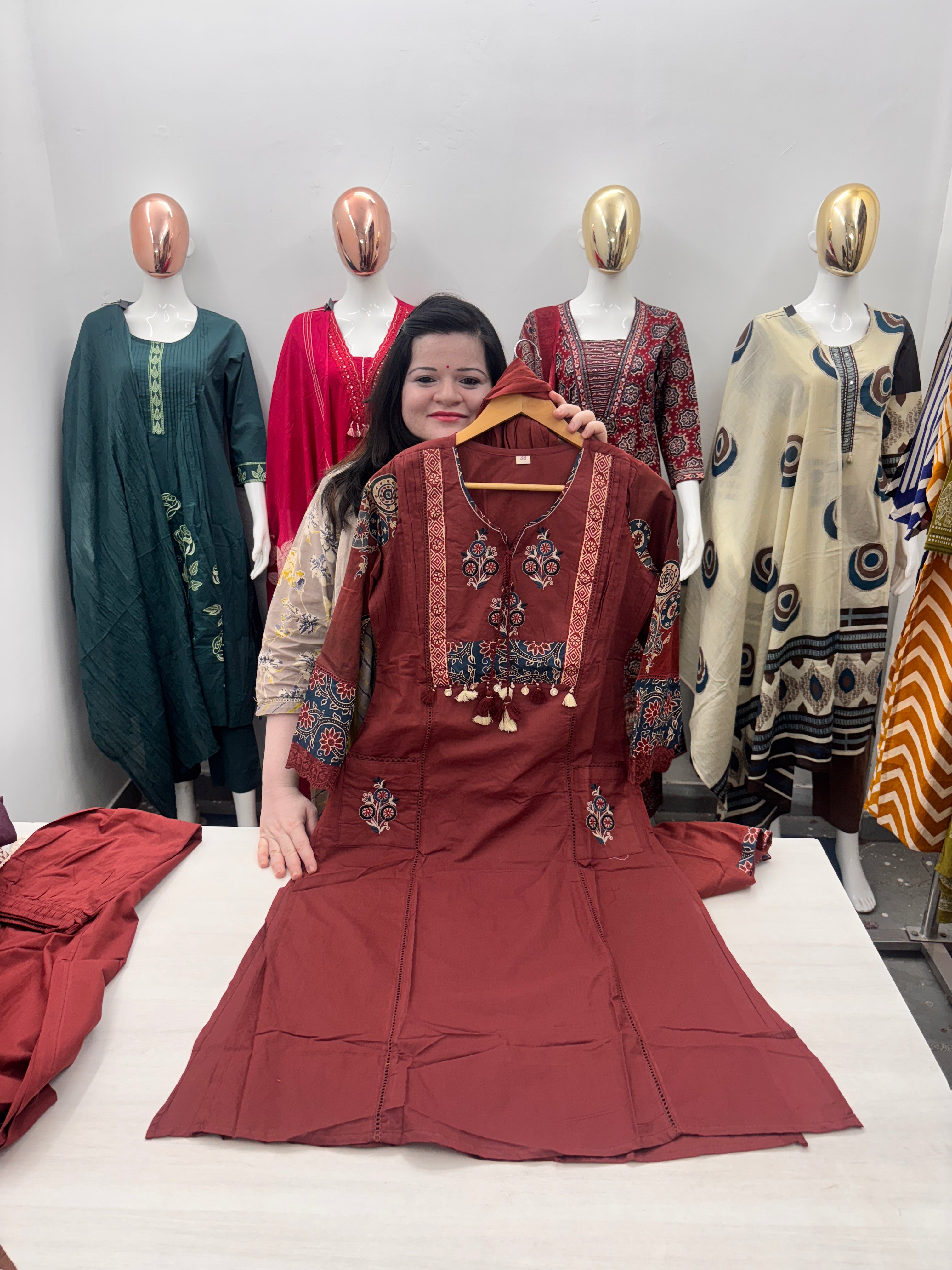 A line plazzo dupatta suit set with front pocket and embroidery detailing on neck