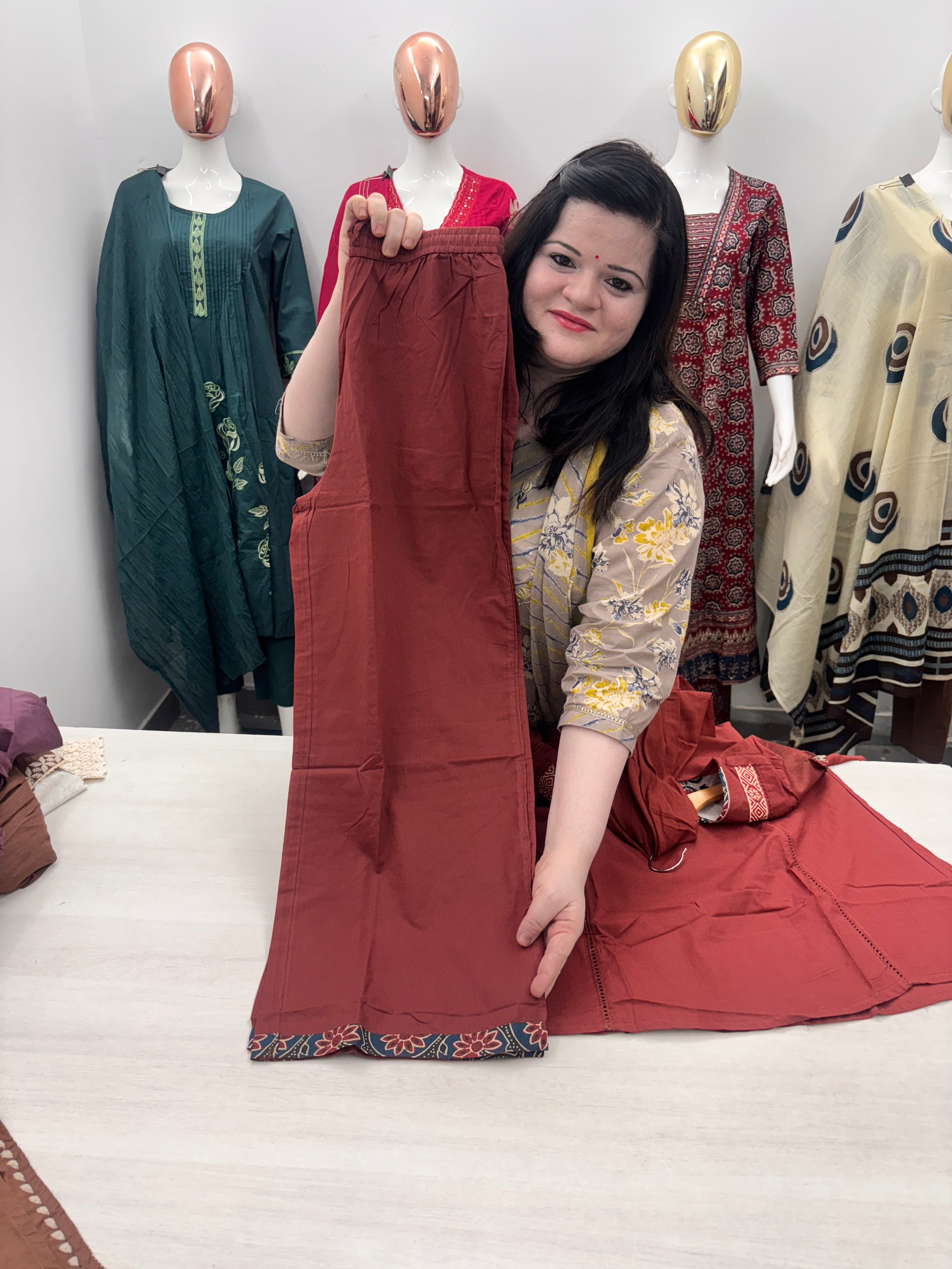 A line plazzo dupatta suit set with front pocket and embroidery detailing on neck