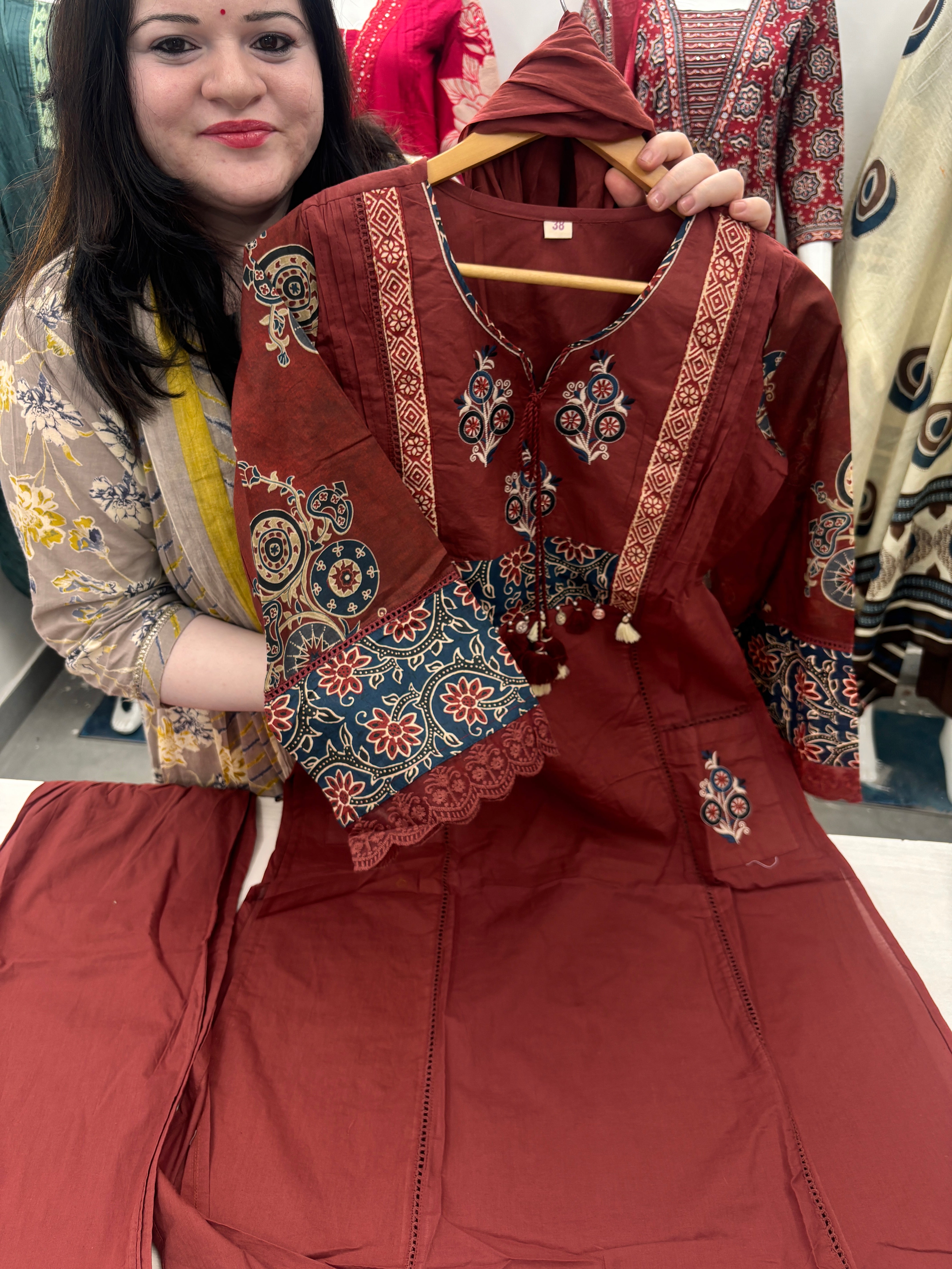 A line plazzo dupatta suit set with front pocket and embroidery detailing on neck