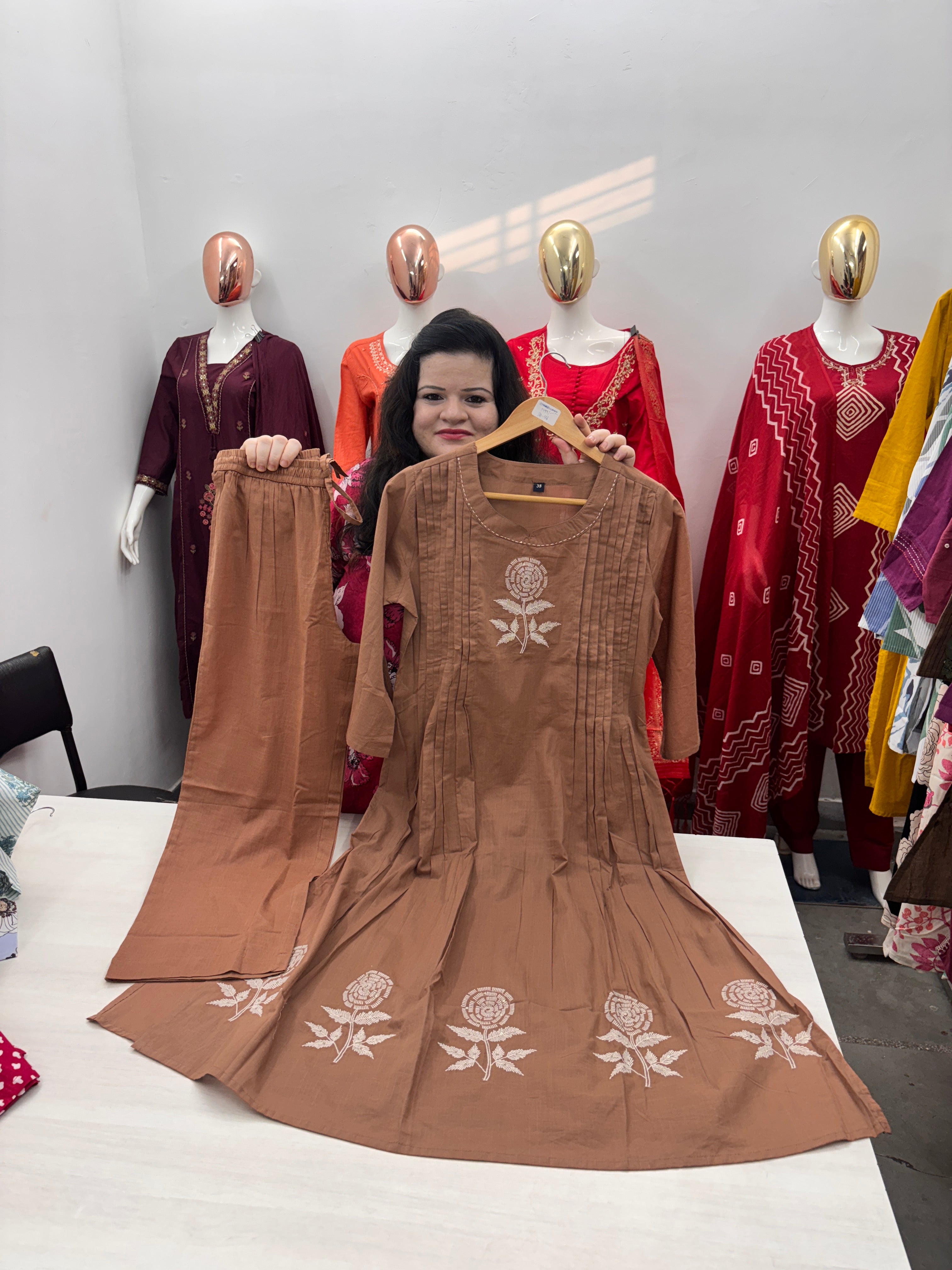 Round neck coord set with hand work and pintex style