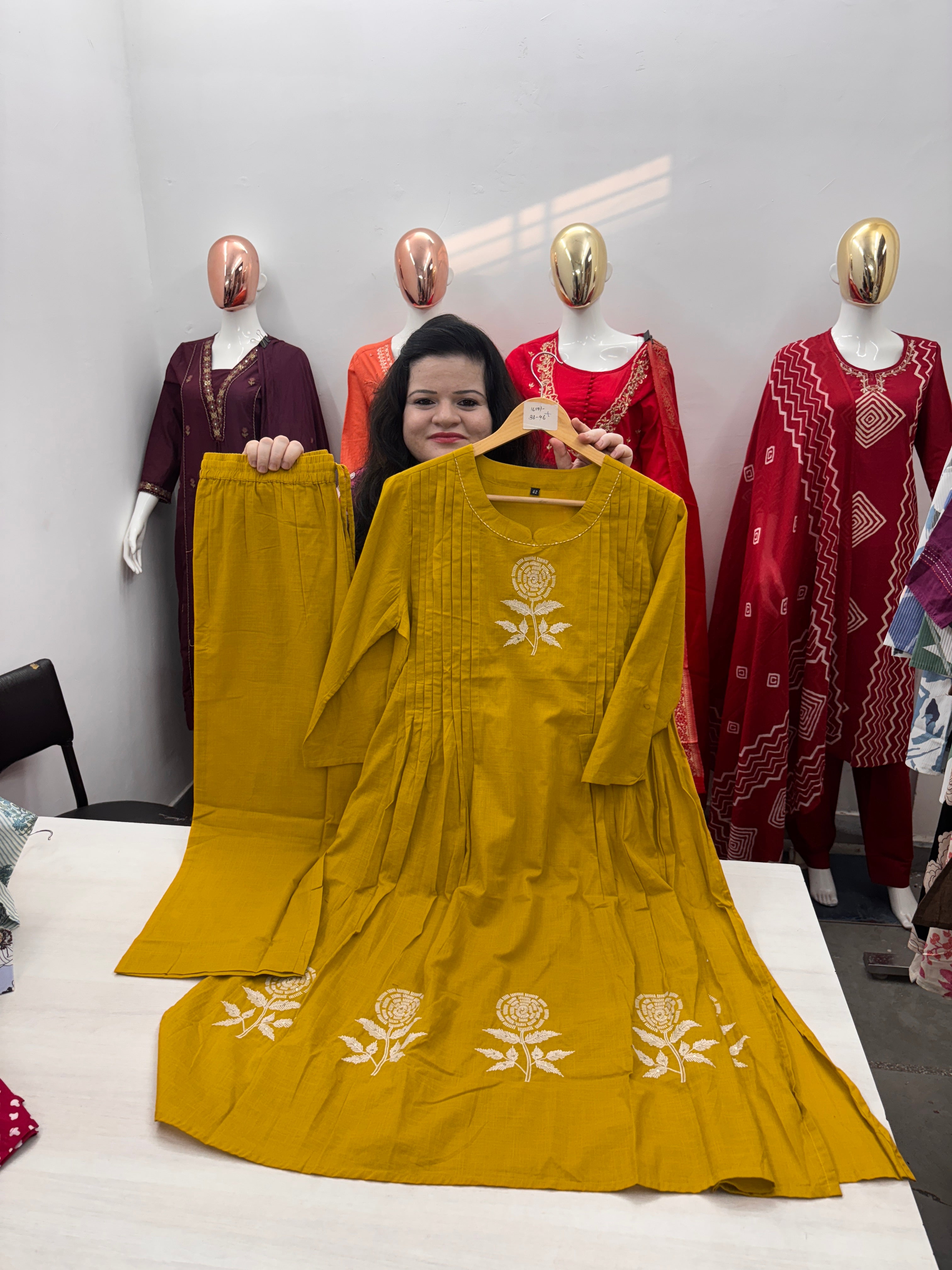 Round neck coord set with hand work and pintex style