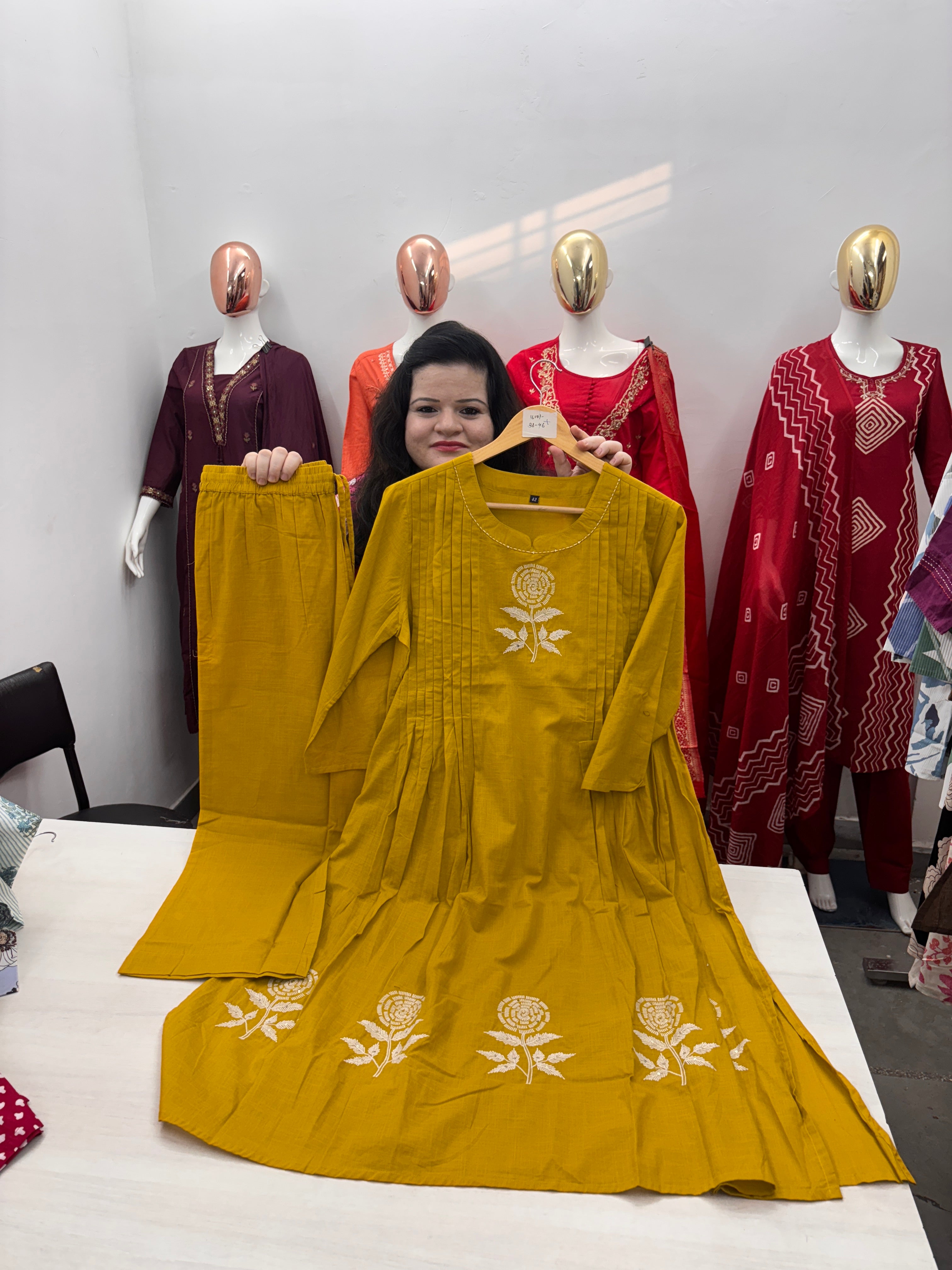 Round neck coord set with hand work and pintex style